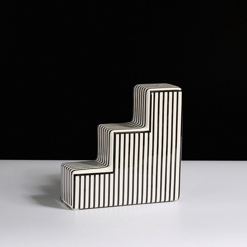 Black and white striped ceramic vase