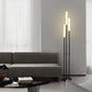 Creative Acrylic Floor Lamp Beside Sofa And Coffee Table In Living Room