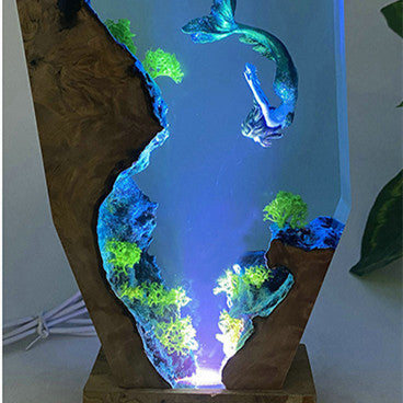 Scenic mermaid ocean landscape lamps bring the beauty and tranquility of the underwater world into your home. They come in a variety of styles and designs, featuring enchanting mermaids, vibrant coral reefs, and calming ocean waves. Here are some ideas to inspire you: